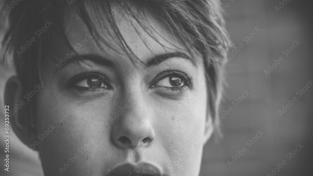 Black and white close up of young woman's face Black and white close up of young woman's face