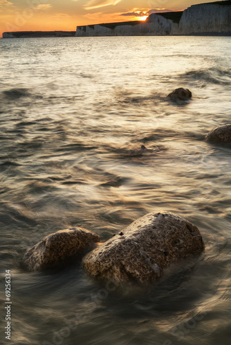 Landscape image of sunset over Birling Gap in England photo