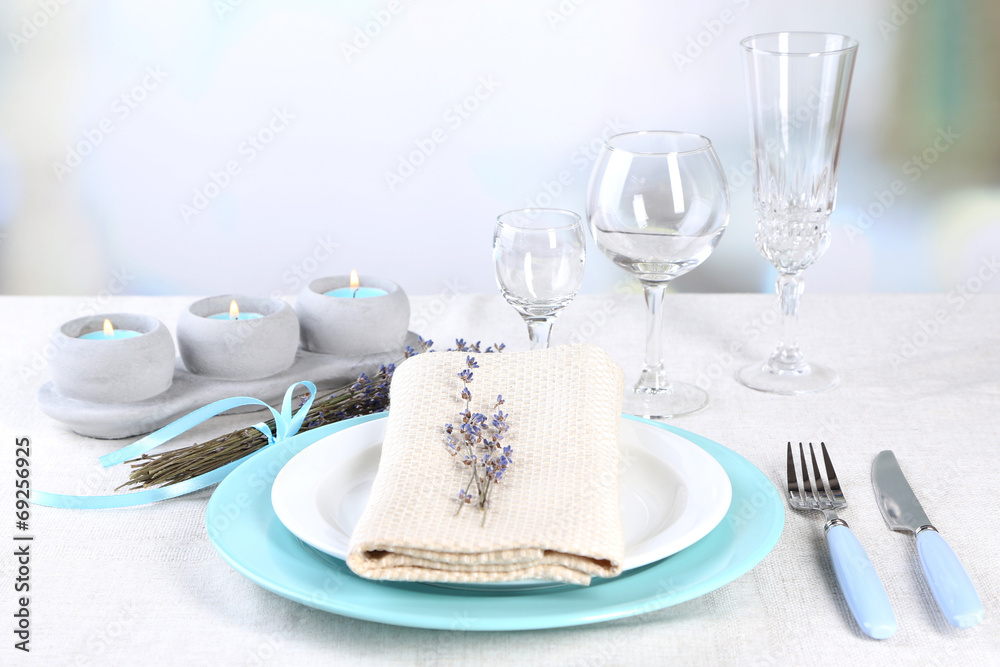 Dining table setting with lavender flowers Dining table setting with lavender flowers
