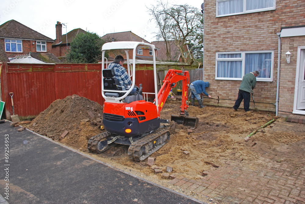 Builders digging a drive in the UK