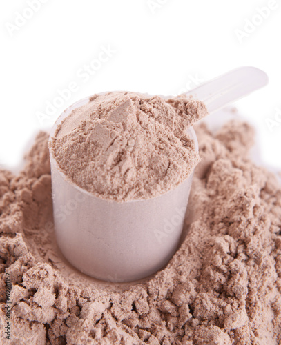 Whey protein powder in scoop isolated on white