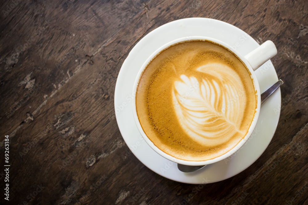 Cup of latte coffee on wood Cup of latte coffee on wood