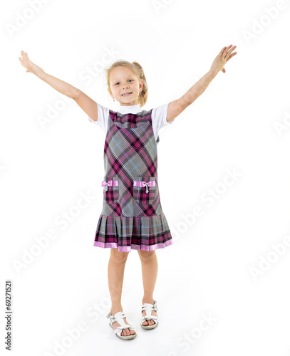 happy excited little girl dancing on white background