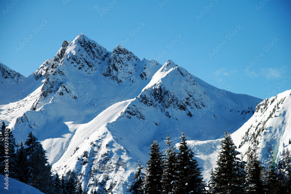 Alpine peaks covered with fresh snow the fallen