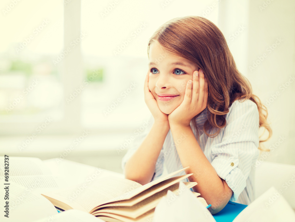 student girl writing in notebook at school student girl writing in notebook at school
