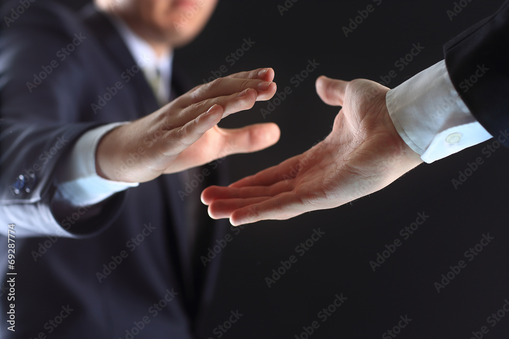hands of business partners before handshake