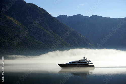 Boat and smoke © Valery Shanin