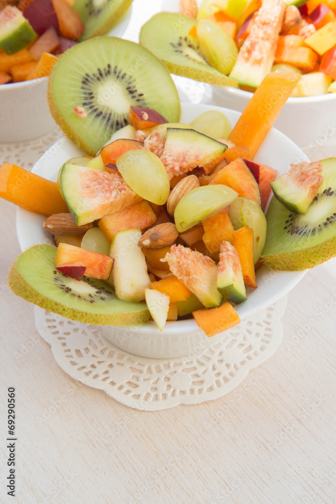 Fruit salad in the white plate Fruit salad in the white plate