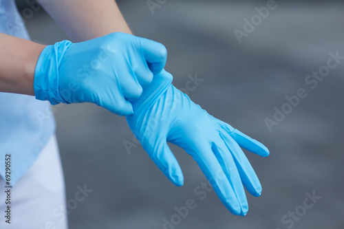 Fotografie, Obraz woman doctor wears medical gloves