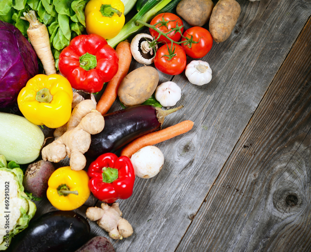 Huge group of fresh vegetables on wooden table - High quality st Huge group of fresh vegetables on wooden table - High quality st