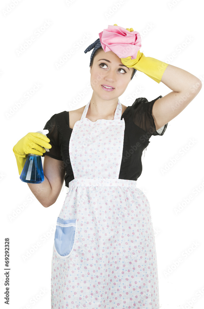 Young girl wearing apron and holding cleaning products Young girl wearing apron and holding cleaning products