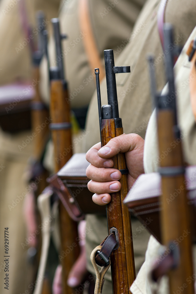 Naklejka premium the rifle in hand