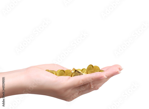 Holding gold coins