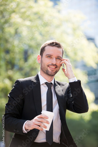 Businessman drinking a coffee during a break