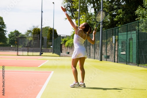 Pretty tennis player about to serve © WavebreakMediaMicro