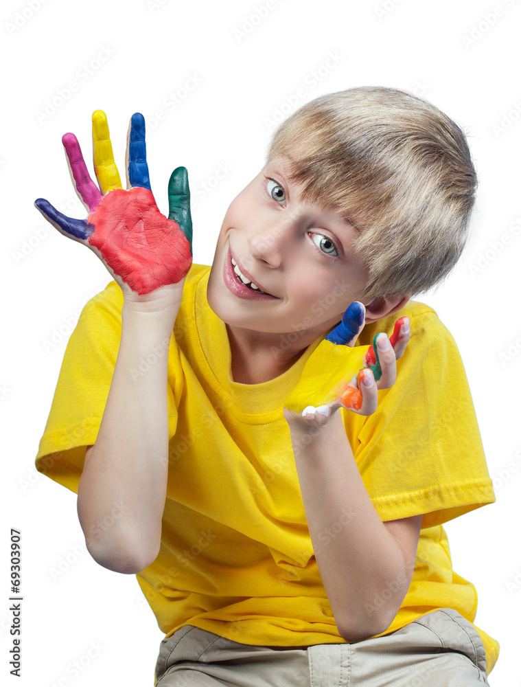 Beautiful funny child in t-shirt showing painted hands Beautiful funny child in t-shirt showing painted hands