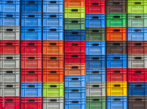 stack of colorful plastic boxes