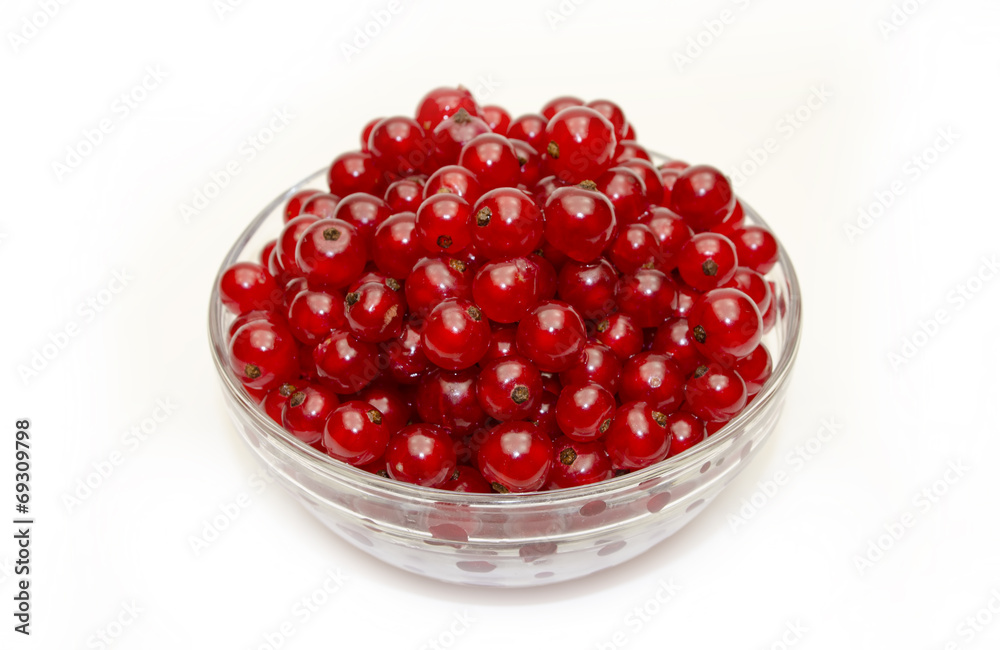 fresh red currants in a glass bowl fresh red currants in a glass bowl
