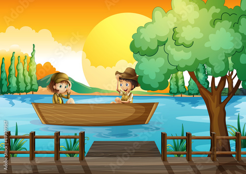 A boy and a girl at the boat
