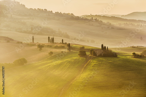 Rural landscape of Tuscany on a hazy sunny morning