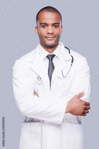Confident male doctor. © gstockstudio