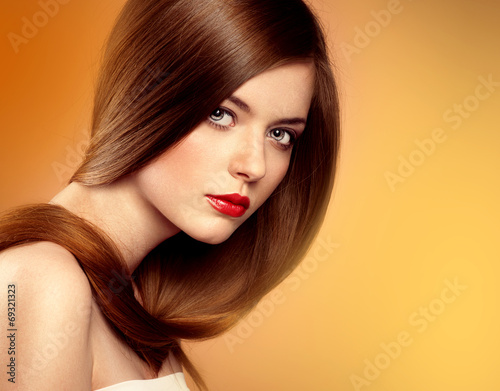 Young beautiful woman with perfect healthy hair