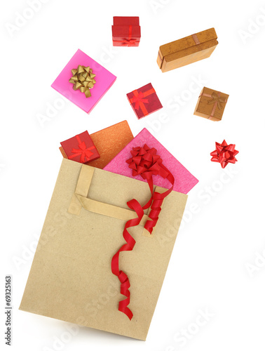 Gift boxes coming out of a shopping bag