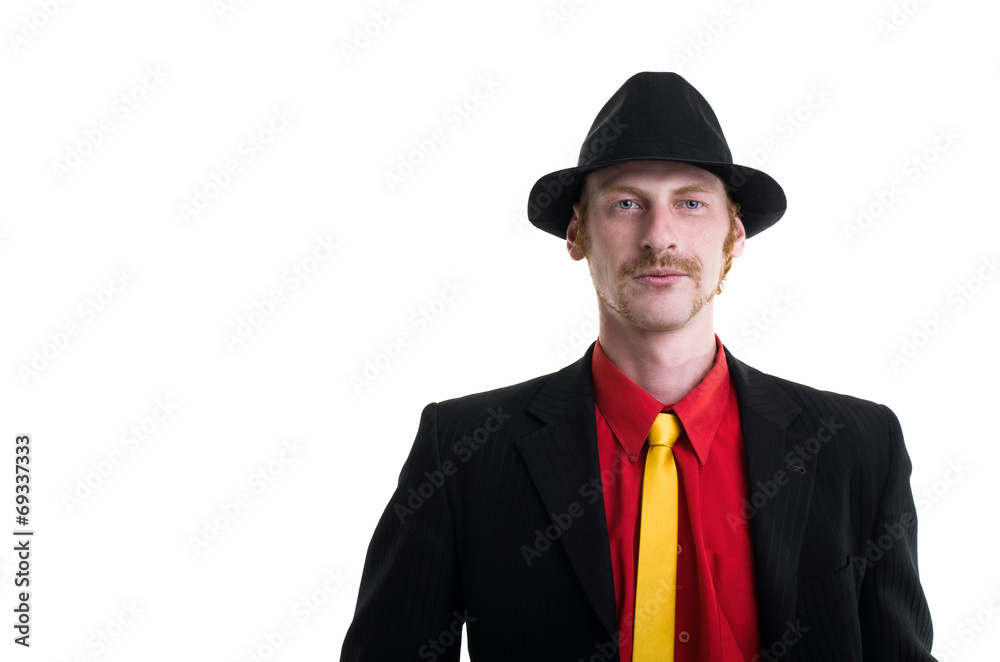Man in suit and hat on white