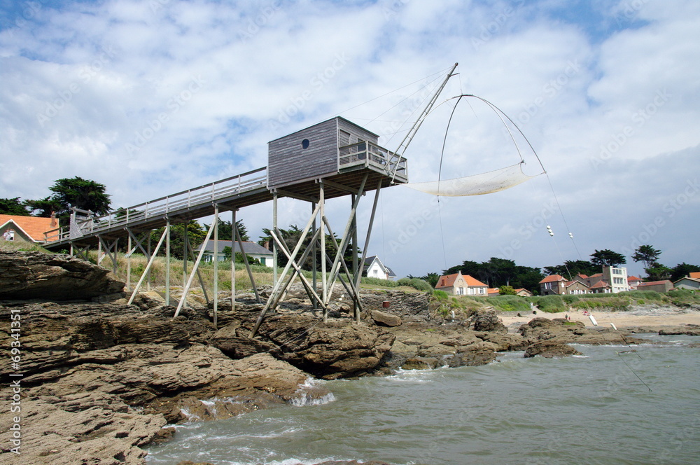 carrelet sur l'océan a marée basse