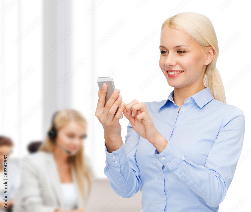 young smiling businesswoman with smartphone young smiling businesswoman with smartphone