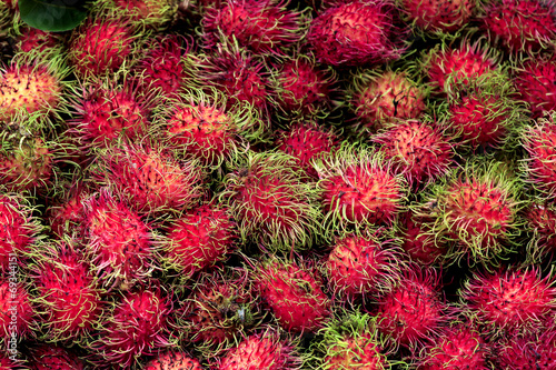 Group of Sweet Red Rambutan Group Lay as Pattern.