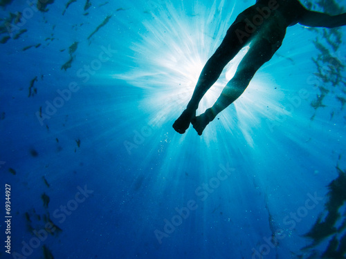 Man descending under the sea