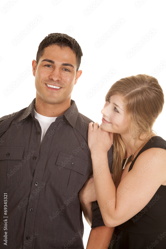 couple dark outfits her look at him smile couple dark outfits her look at him smile