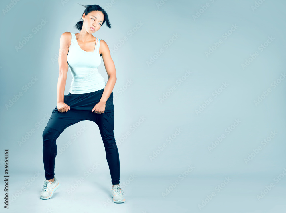 Fototapeta premium Attractive young woman posing in studio