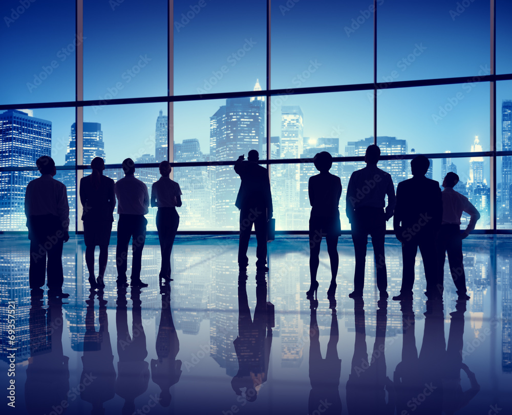 Silhouettes of Business People in an Office Building