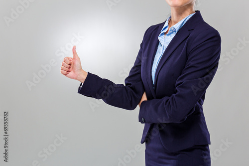 Businesswoman with thumb up