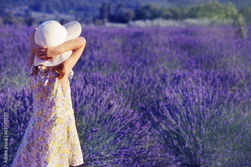 Little girl looking at the lavender field
