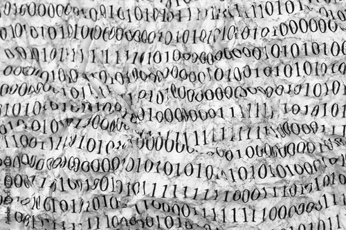 Crushed paper with binary code