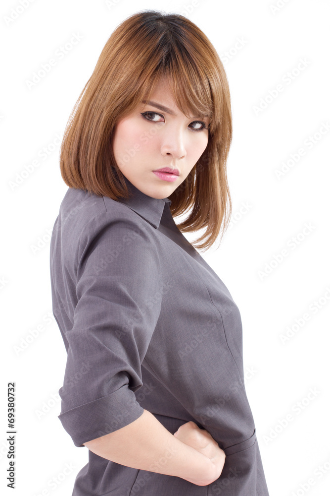 angry, serious, upset business woman with arms akimbo, looking s angry, serious, upset business woman with arms akimbo, looking s