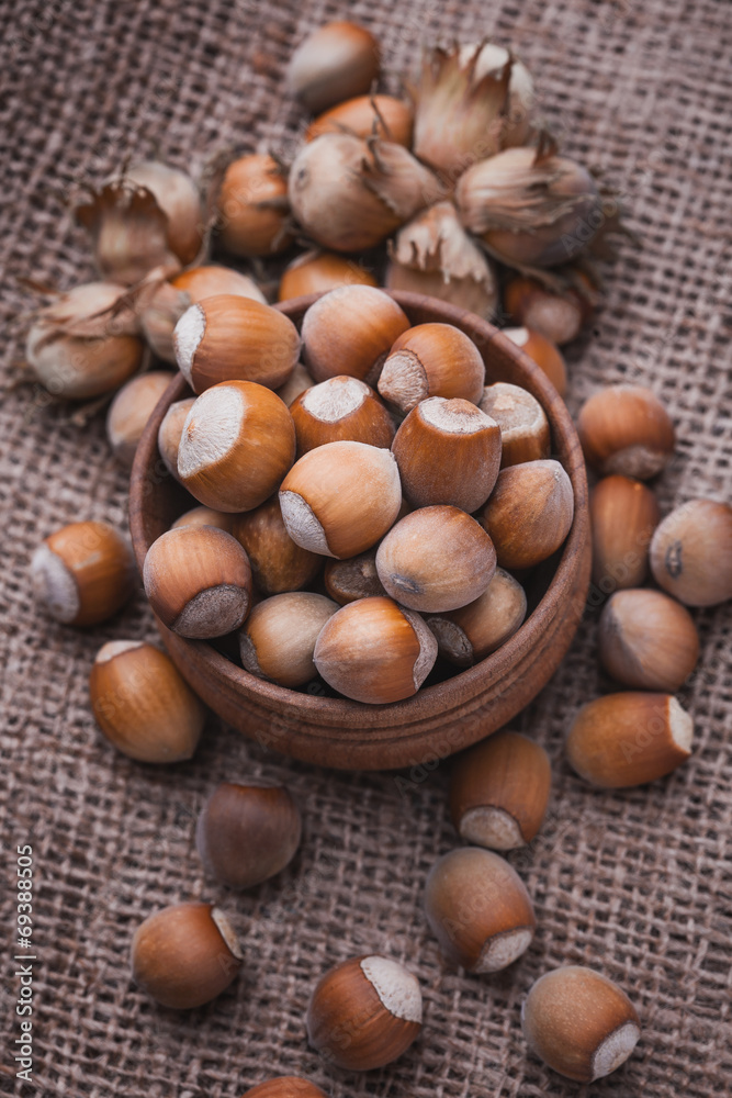 hazelnut on a wooden table hazelnut on a wooden table