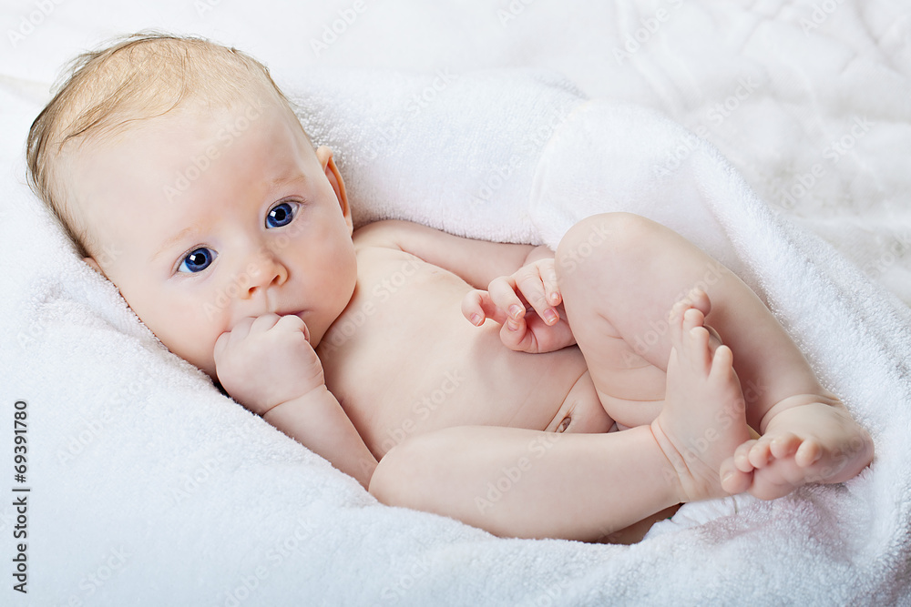 Adorable naked baby with blue eyes Adorable naked baby with blue eyes