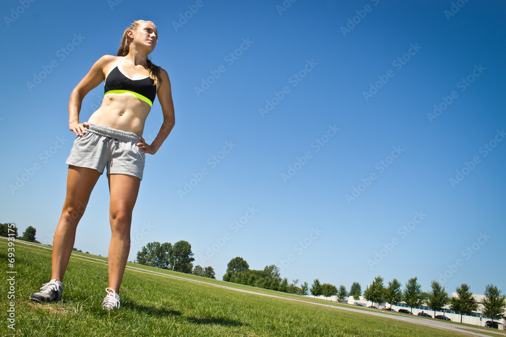 Fit, athletic woman determined to reach her goals Fit, athletic woman determined to reach her goals