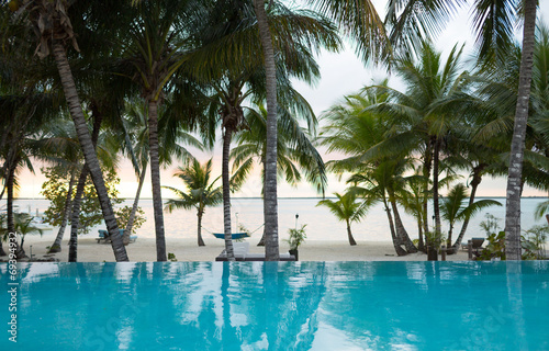 swimming pool on tropical beach © Syda Productions