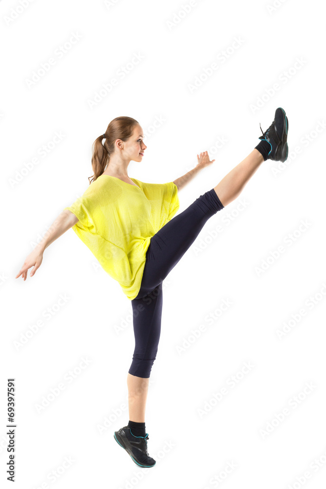 Image of flexible young beautiful girl doing vertical split