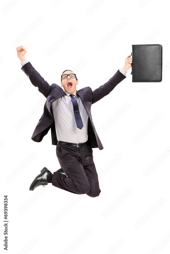 Delighted businessman jumping out of joy Delighted businessman jumping out of joy