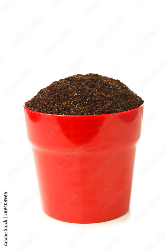 soil in the red pot, isolated on white soil in the red pot, isolated on white