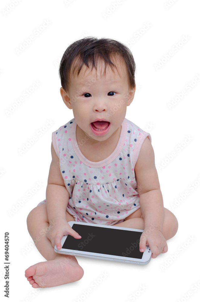 Asian baby is sitting and playing with tablet pc Asian baby is sitting and playing with tablet pc