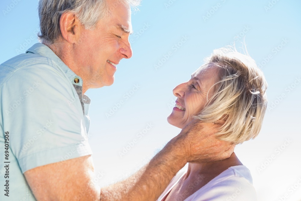 Senior woman hugging her partner Senior woman hugging her partner