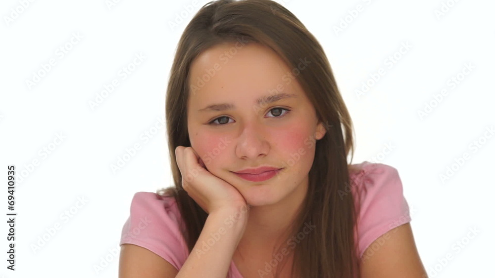 Young girl sticking out her tongue