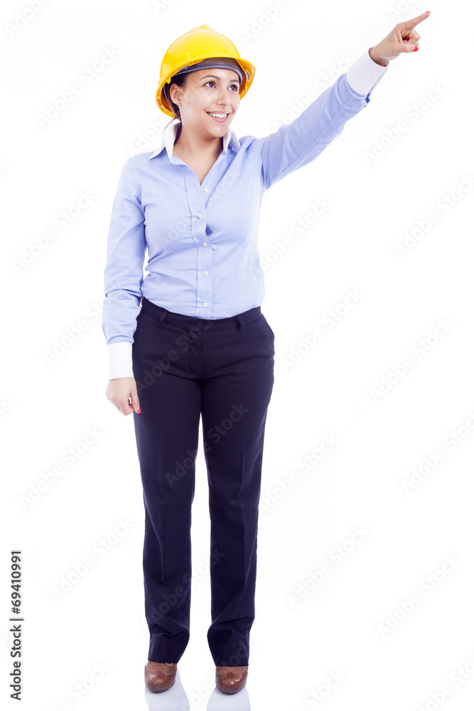Female engineer pointing, isolated on white background Female engineer pointing, isolated on white background
